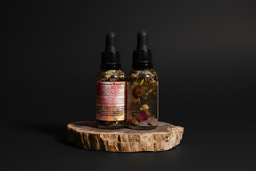 Attraction oil in a dropper bottle on a cloth.