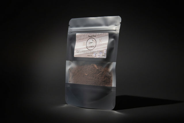 Bank Dirt in labeled black packaging on a dark background