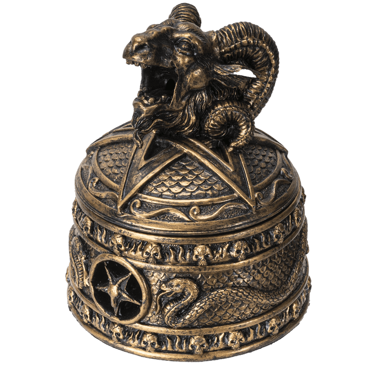 Decorative bronze bell with ram's head on a transparent background
