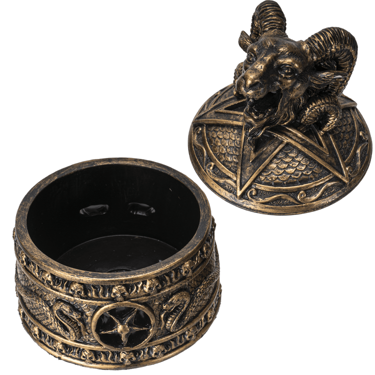 Bronze-colored decorative item with ram head design on a white background