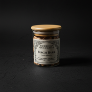 Dried birch bark (Betula pubescens) in a labeled glass ritual herb jar