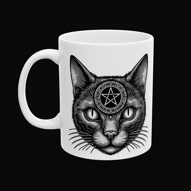 black cat white mug black background.