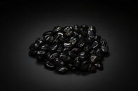Representative polished black stones sold as Black Onyx; shape, polish, banding, and size vary