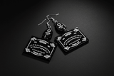 Black Ouija board earrings with spirit-board inspired design