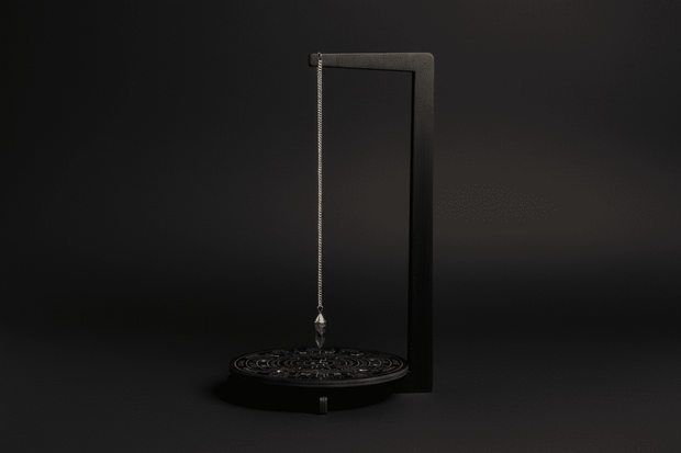 Black wooden pendulum stand for altar display