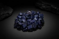 Representative polished deep-blue Blue Goldstone glass pieces; sparkle, shape, polish, and size vary