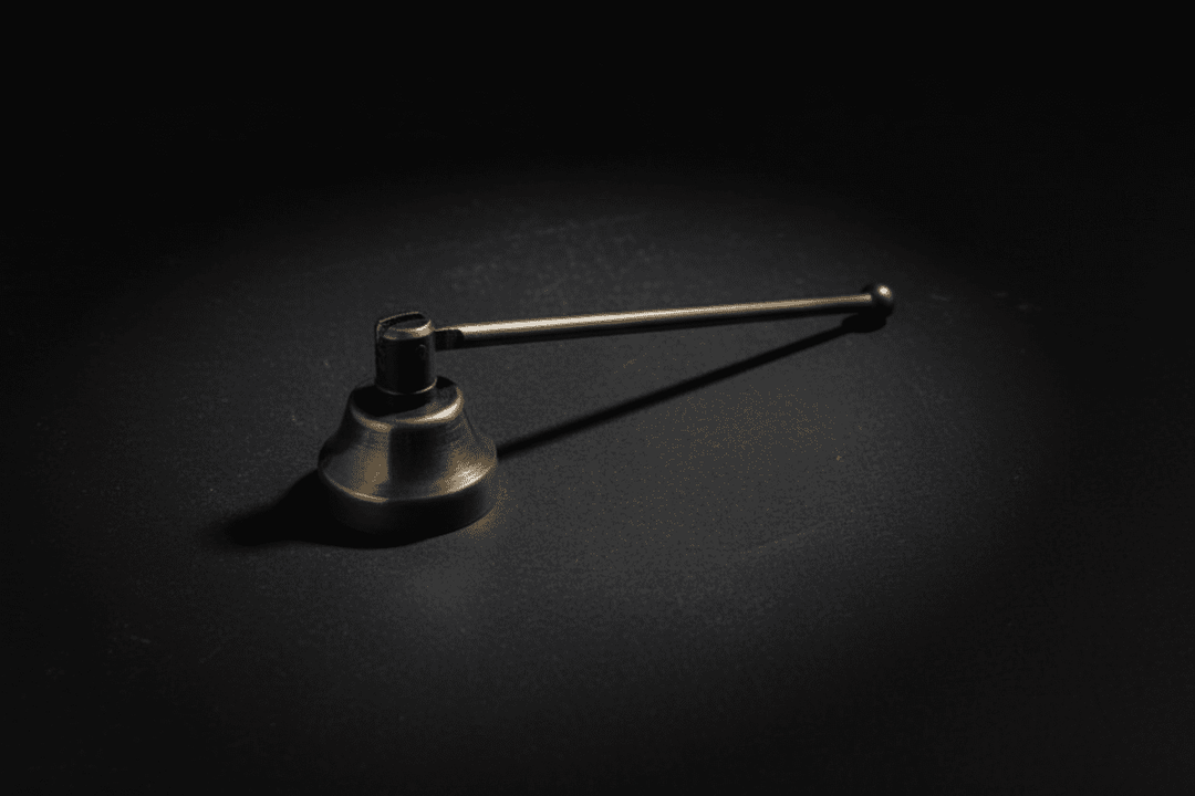 Five-inch brass candle snuffer for altar use