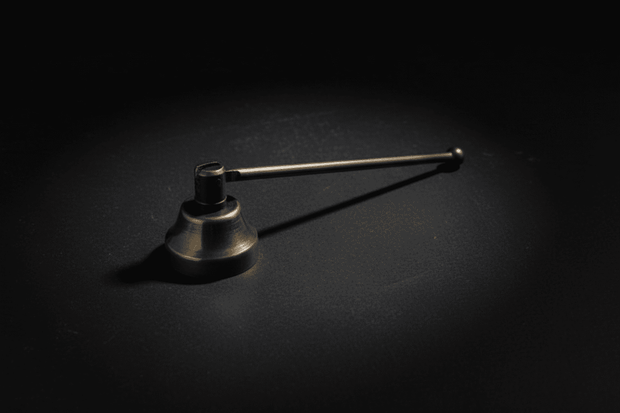 Five-inch brass candle snuffer for altar use