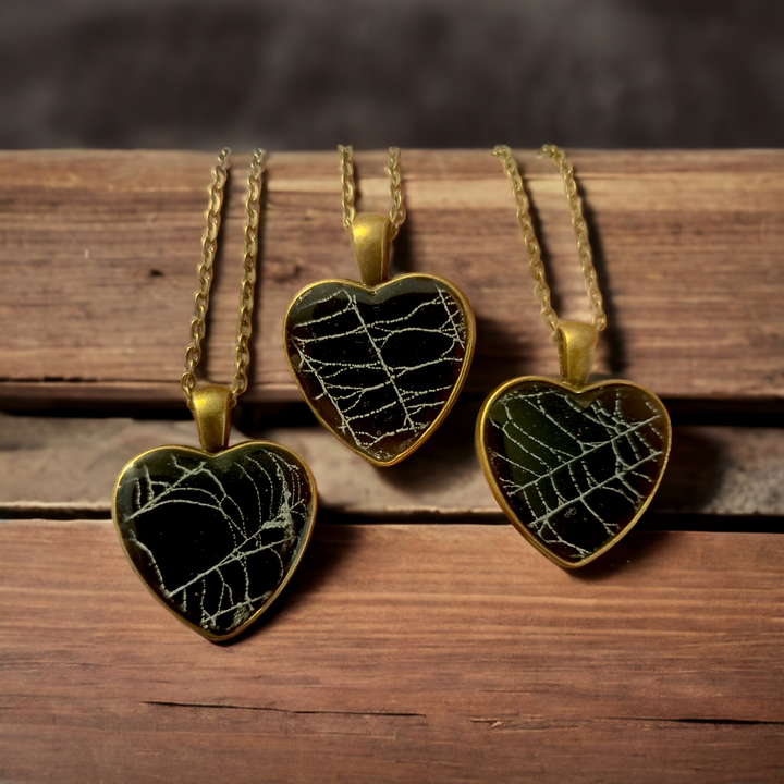 Spiderweb heart pendant close-up