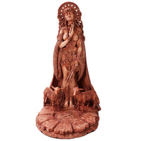 Decorative statue of a woman with a headdress and animals on a white background