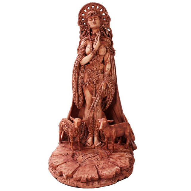 Decorative statue of a woman with a headdress and animals on a white background