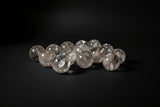 Polished Clear Quartz sphere with natural internal inclusions