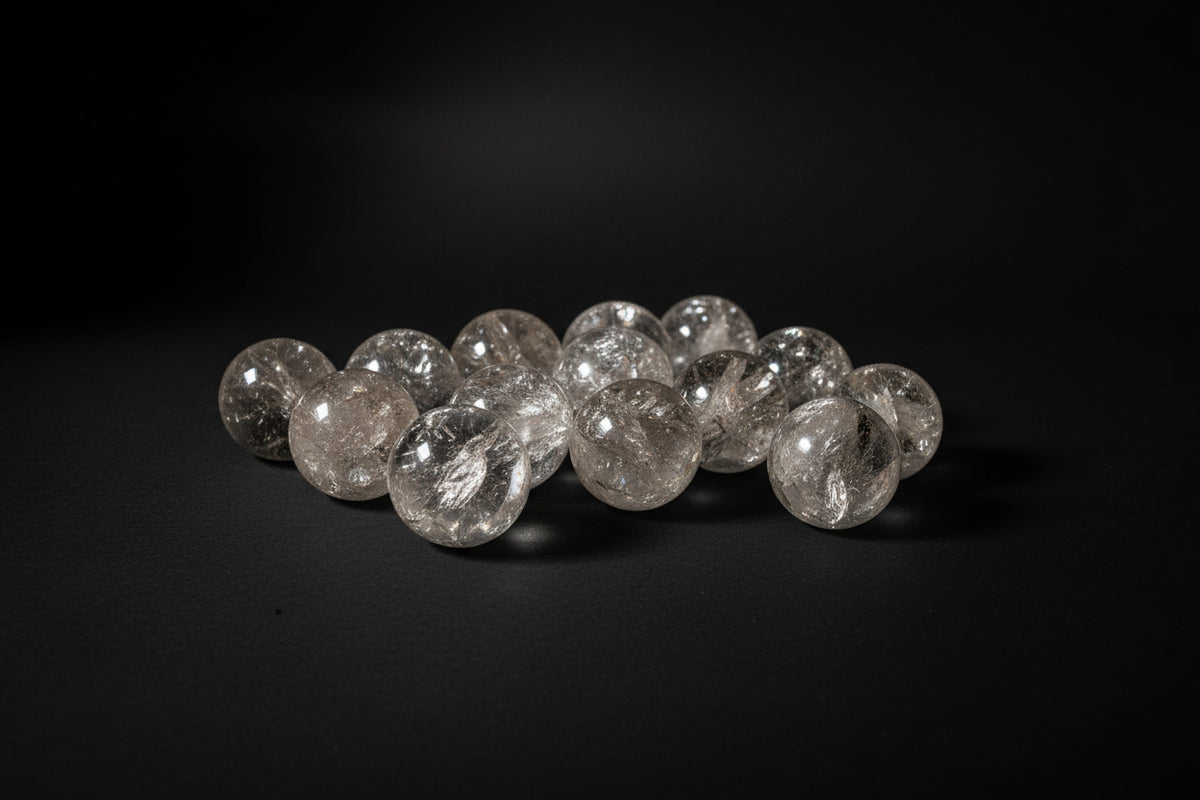 Polished Clear Quartz sphere with natural internal inclusions