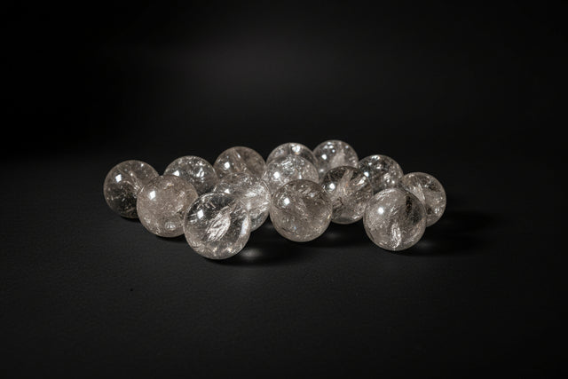 Polished Clear Quartz sphere with natural internal inclusions