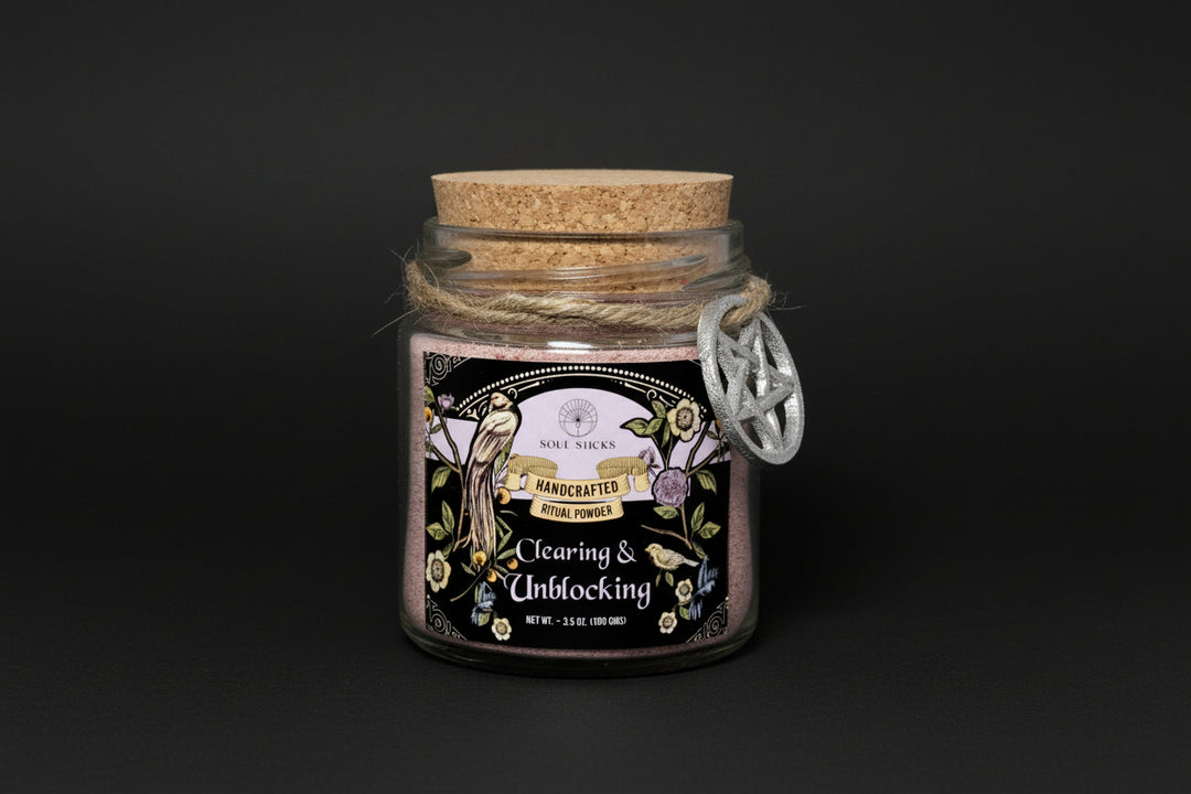 Glass jar with cork lid containing &