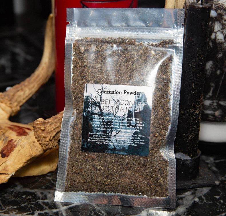 Packaged confusion powder with a label on a dark surface