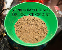 Green bowl with dirt and text indicating approximate mass of one ounce of dirt