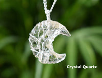 Crystal Quartz necklace against a blurred green background