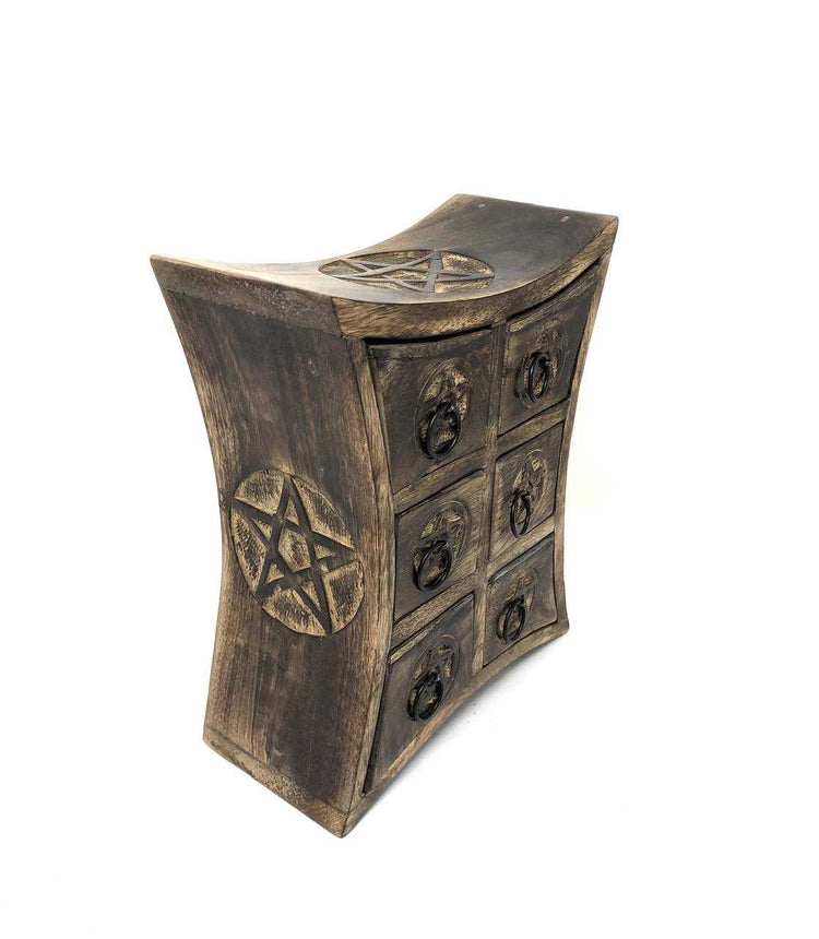Wooden chest with pentagram design on a white background