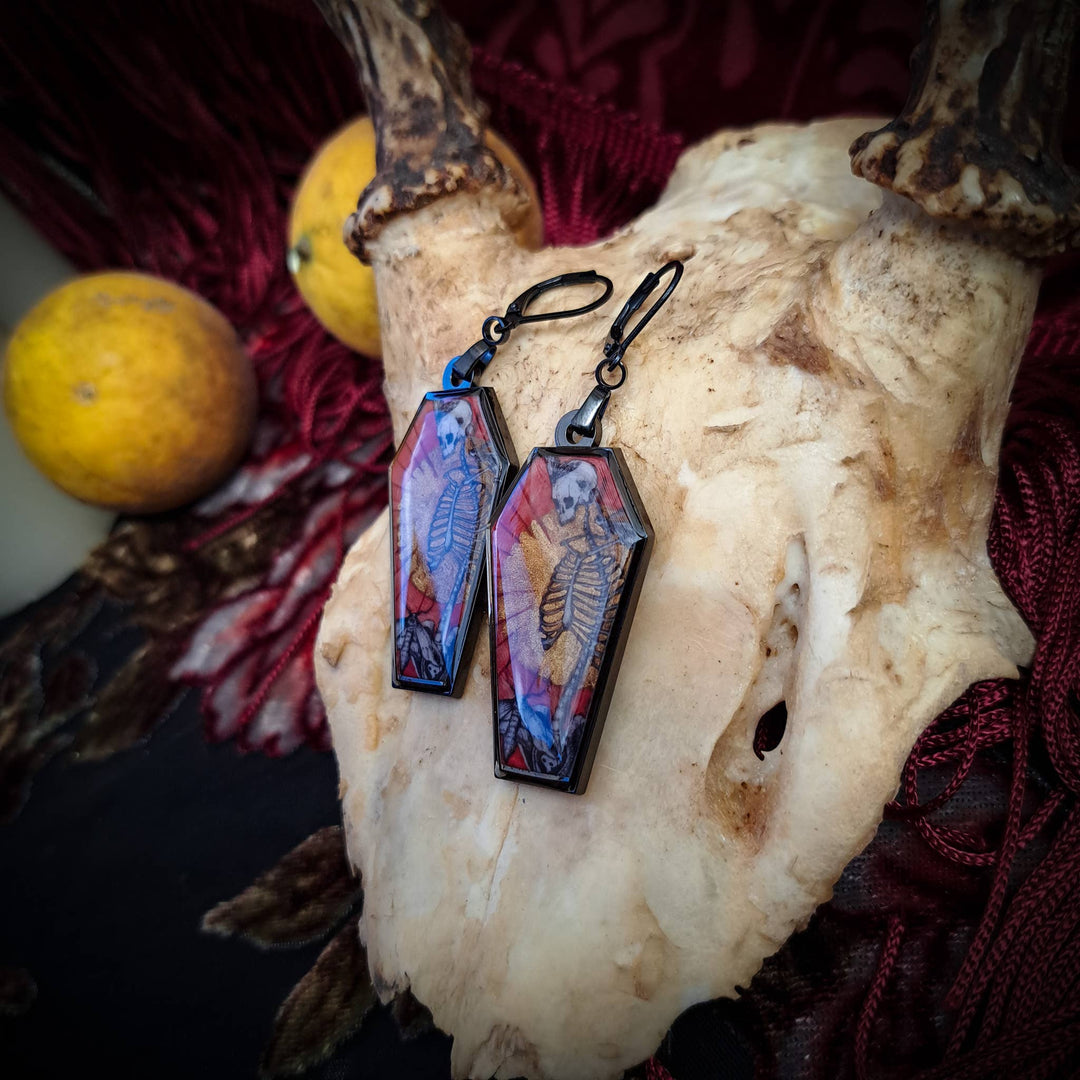 Skull and Savior black earrings side view