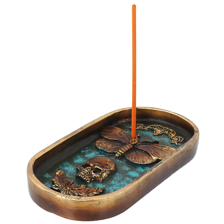 Moth and skull burner design detail