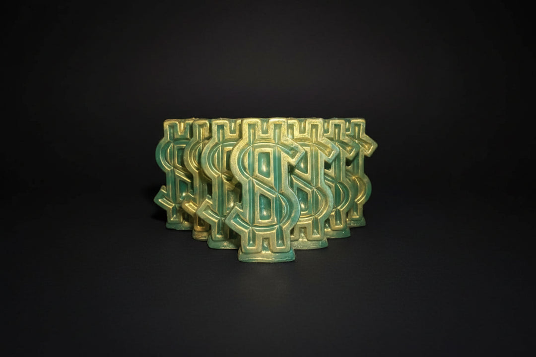 Green wax mold with intricate design and &