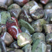 Close-up of green and red marbled stones