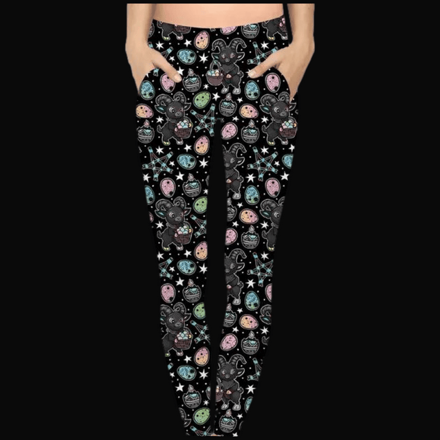 Black leggings with a pattern of Baphomet holding an Easter basket, along with colorful eggs, stars, and pentagrams.