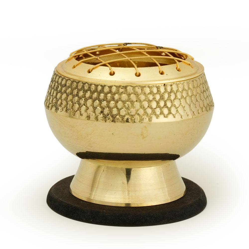 Embossed brass incense burner shown from an alternate angle