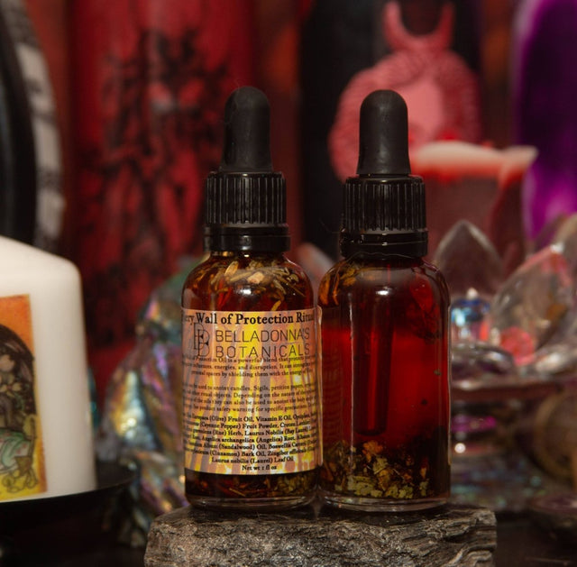 Two tincture bottles with droppers on a stone surface against a mystical background.
