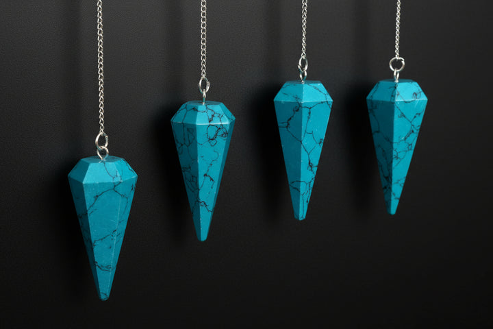 Polished stone-style pendulum with silver-tone chain