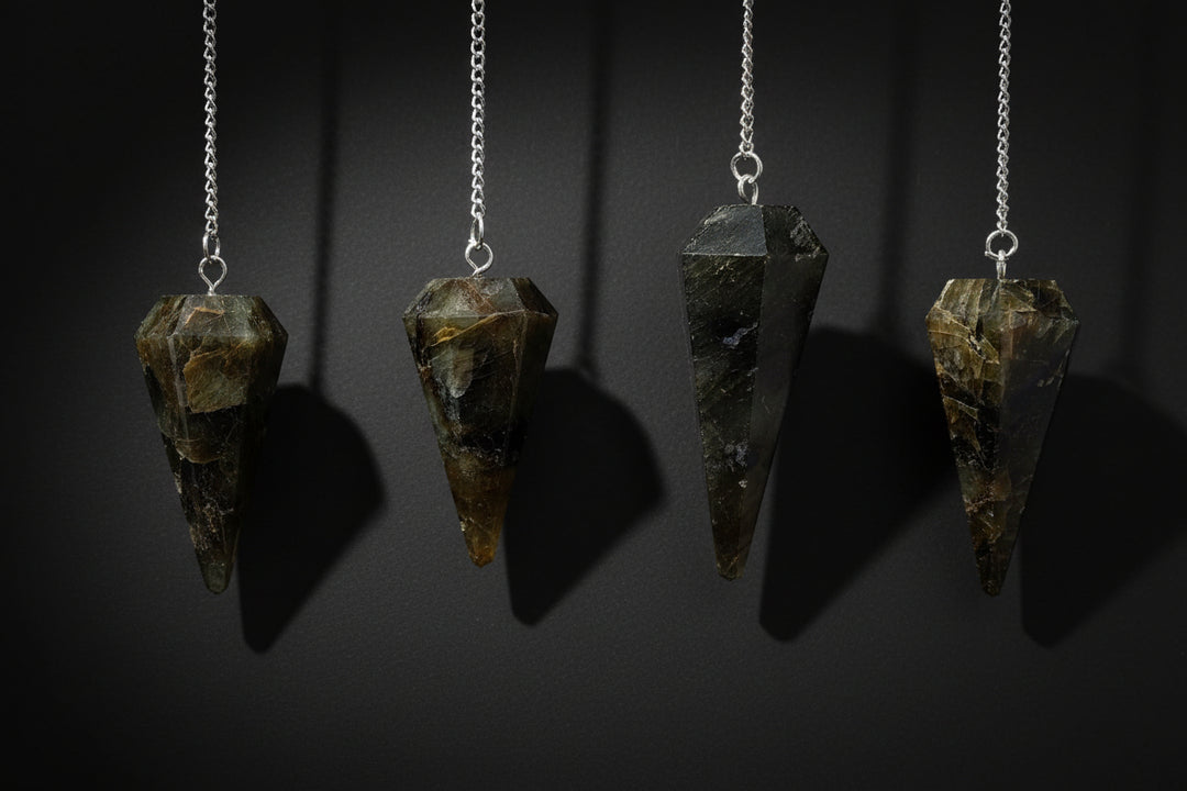 Pointed crystal-style pendulum with chain