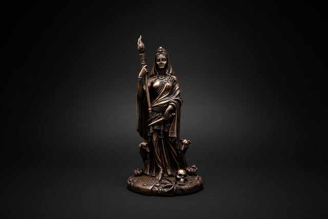 Hecate-inspired statue holding a staff shown from the front