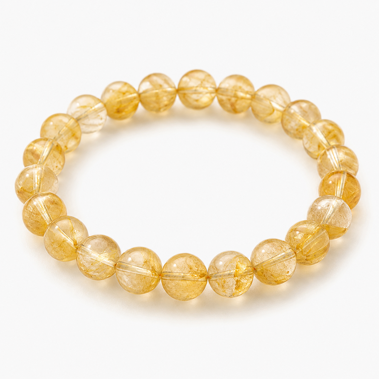 Representative yellow-to-golden beaded stretch bracelet sold under the Golden Healer Quartz trade name; quartz identity, iron phases, treatment, bead dimensions, fit, and exact appearance are unverified