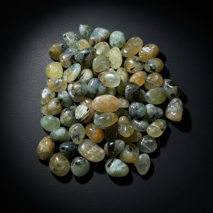 Polished yellow-to-green Prehnite tumbled stones with natural inclusions