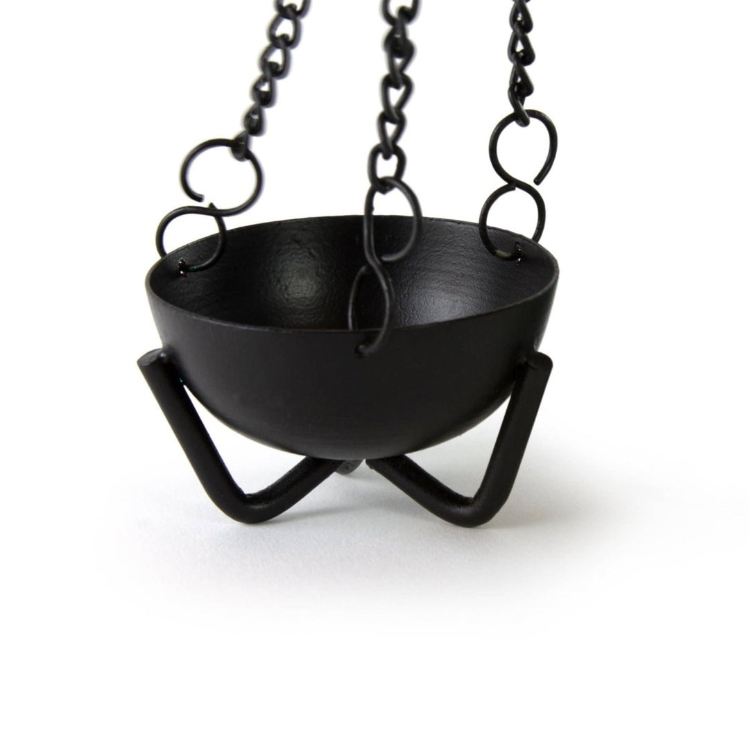 Small hanging cauldron burner shown with chain