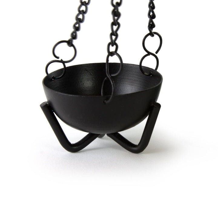Small hanging cauldron burner shown with chain