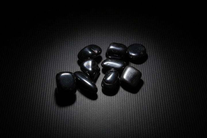 Polished metallic gray Hematite tumbled stone