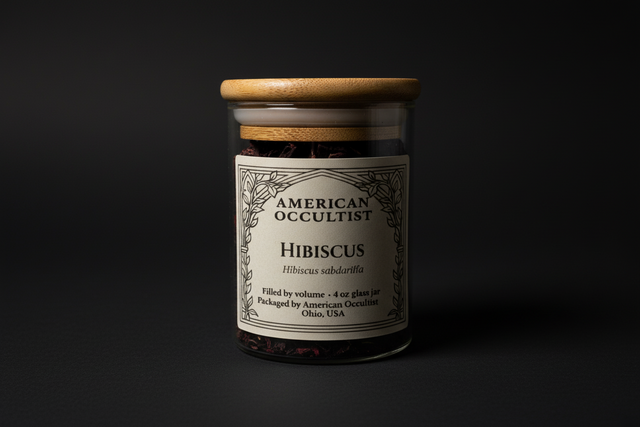 Organic cut hibiscus flowers (Hibiscus sabdariffa) in a labeled glass ritual herb jar