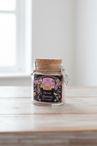 Glass jar with a wooden lid on a light wooden surface with a white background