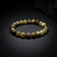 Representative polished beaded stretch bracelet sold as Green Tourmaline; species, green tone, clarity, inclusions, bead size, fit, treatment, and exact condition vary