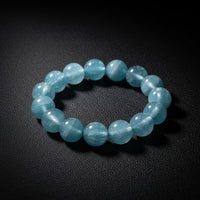 Aquamarine stretch bracelet with pale blue-green polished beads