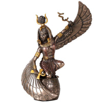Statue of a winged Egyptian goddess on a white background
