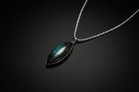 Representative Labradorite pendant necklace with supplier-listed 22-inch .925 sterling silver rope chain; stone shape and flash vary