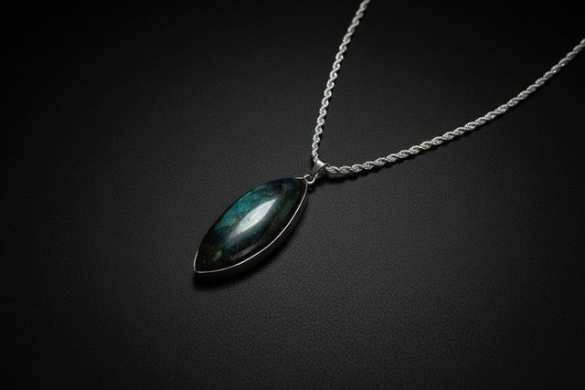 Representative Labradorite pendant necklace with supplier-listed 22-inch .925 sterling silver rope chain; stone shape and flash vary