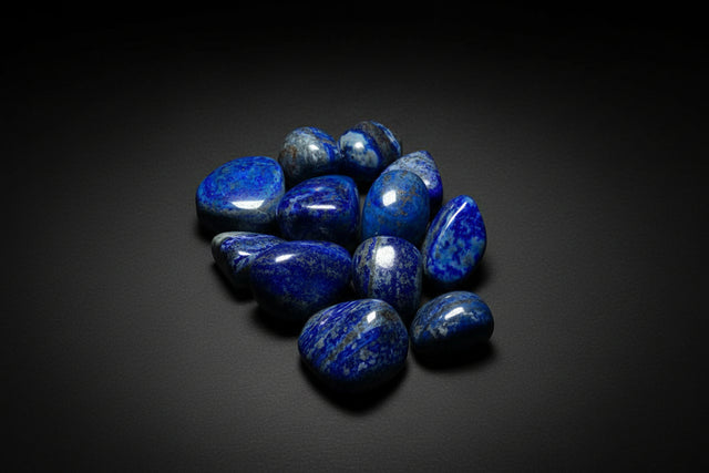 Collection of blue stones on a beige surface