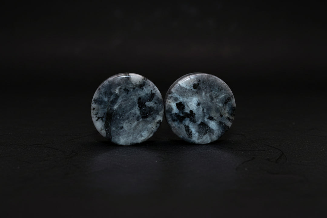 Pair of double-flare stone plugs sold as Larvikite