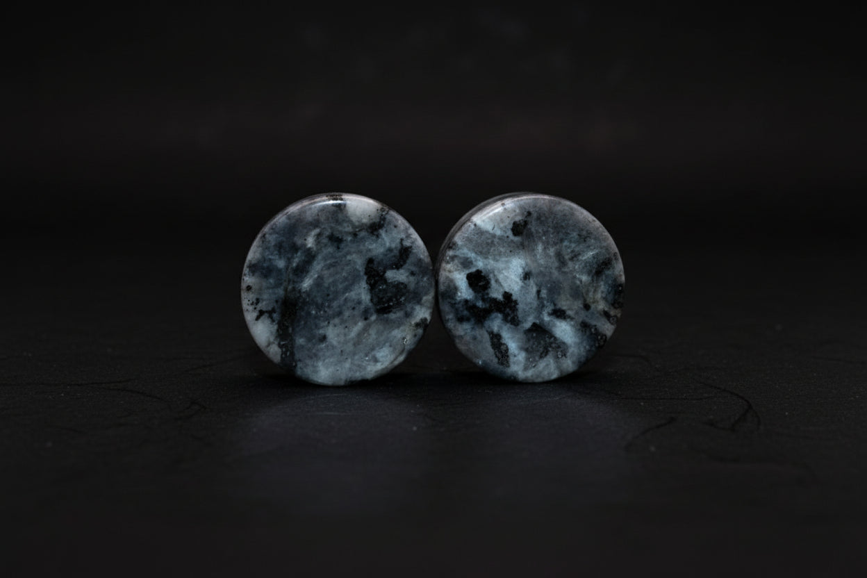 Pair of double-flare stone plugs sold as Larvikite