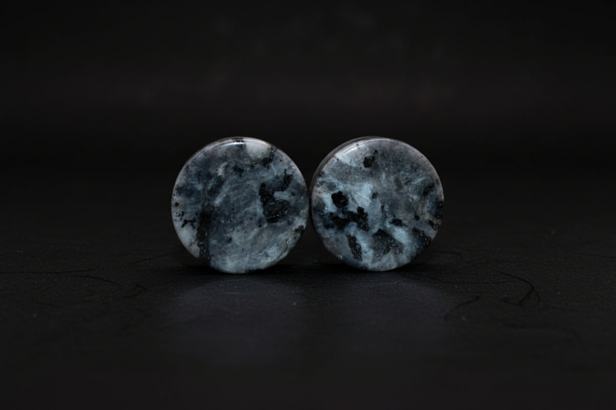 Pair of double-flare stone plugs sold as Larvikite