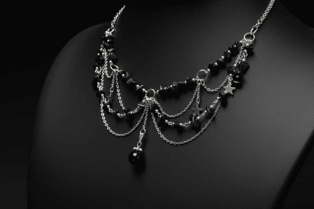 Layered pebble and star necklace with earthy celestial charms